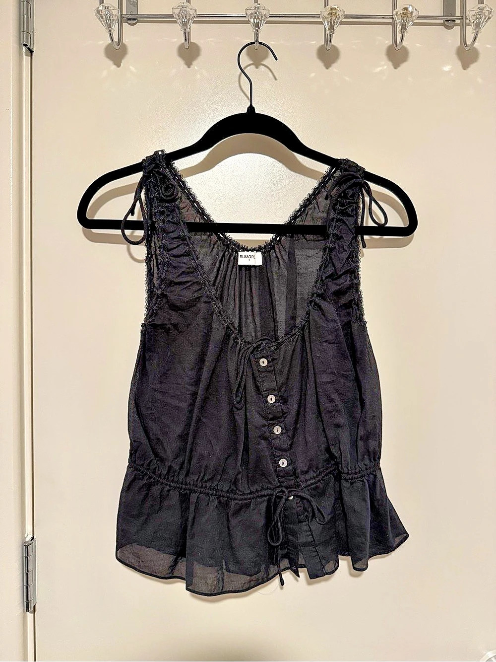 Rumored Black Sleeveless Peplum Top
